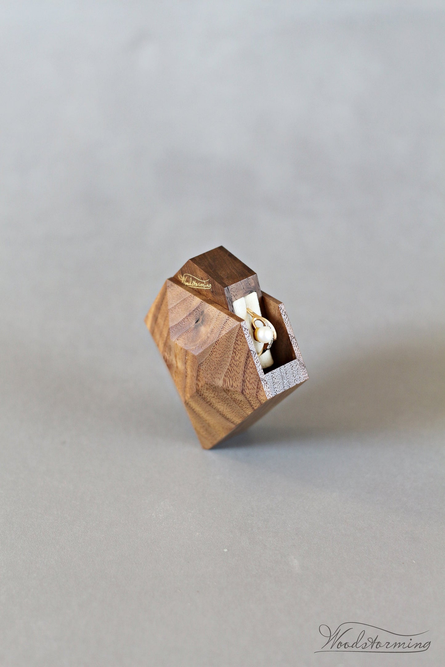 Rotating diamond shape walnut wood ring box by Woodstorming