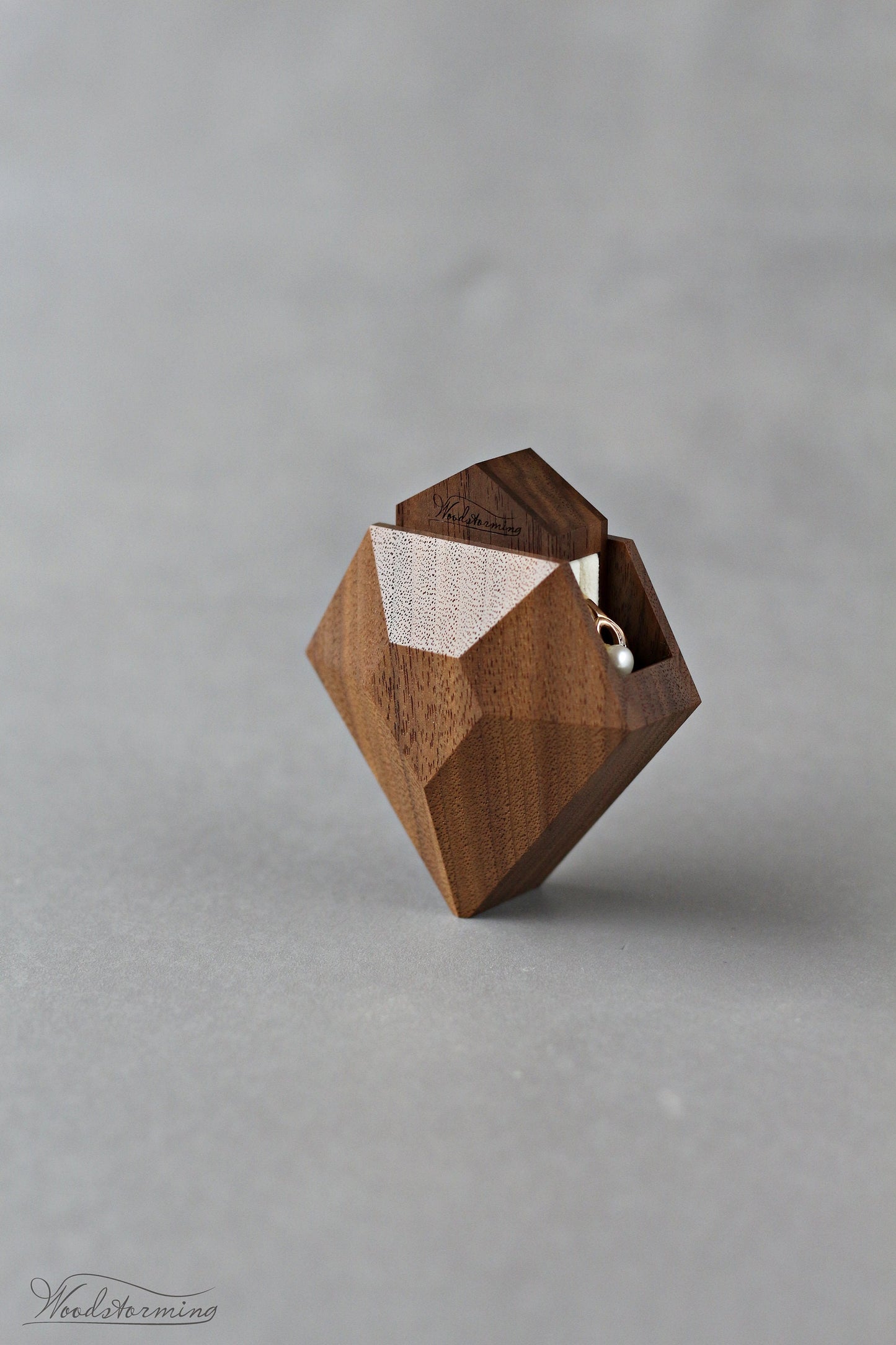 Rotating diamond shape walnut wood ring box by Woodstorming