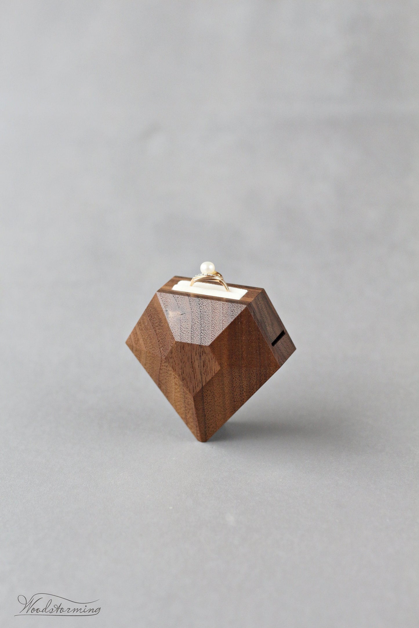 Rotating diamond shape walnut wood ring box by Woodstorming